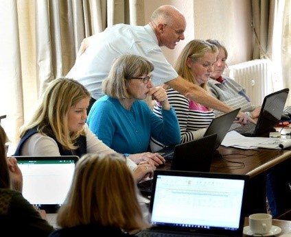 John Legge training Women in Dairy in Excel